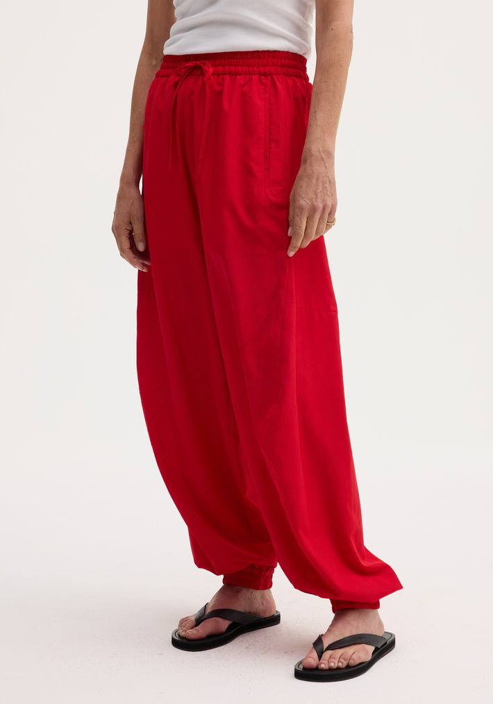Balloon track pants | red