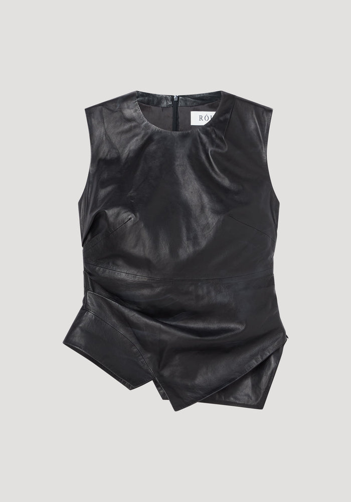 Sleeveless draped leather top in black with asymmetric layered hem, rounded neckline, fitted waist, and center-back zipper, offering a modern elegant silhouette.