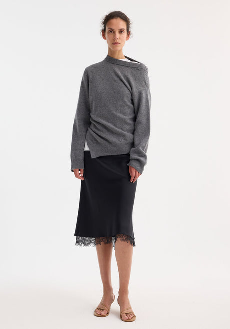 Two-way deconstructed jumper in mid grey melange, featuring a sculptural V-neck, long sleeves, and an angled hemline, crafted from a wool-cashmere blend.