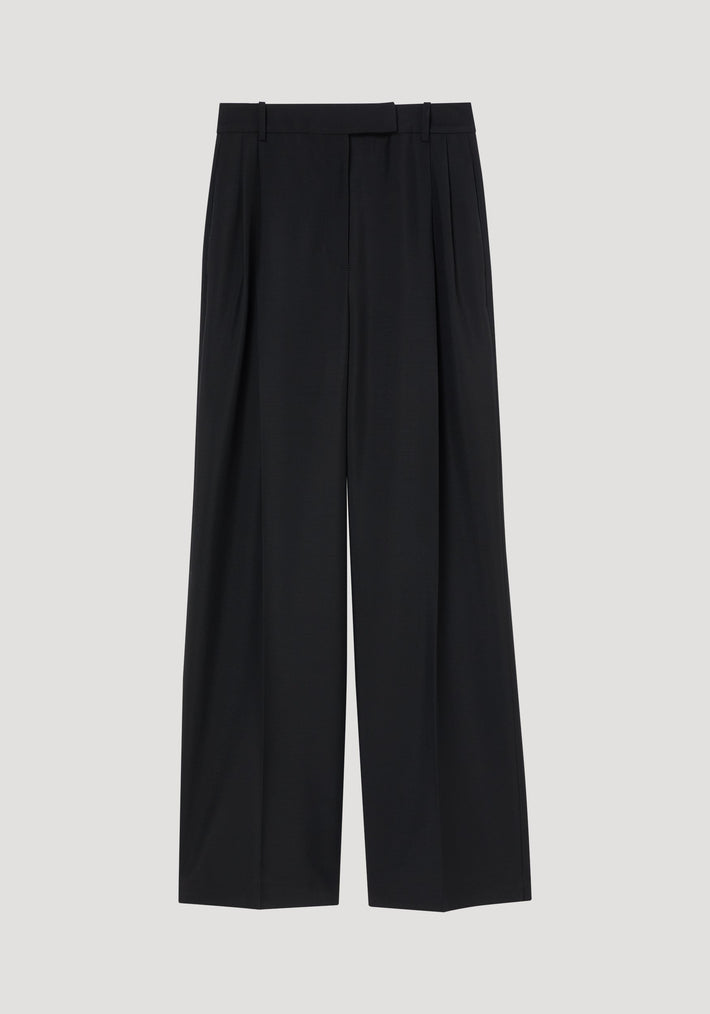Mid-waist tailored trousers in black, featuring a high-waist, belt loops, double pleats, and a wide-leg design, crafted from a wool-mohair blend.