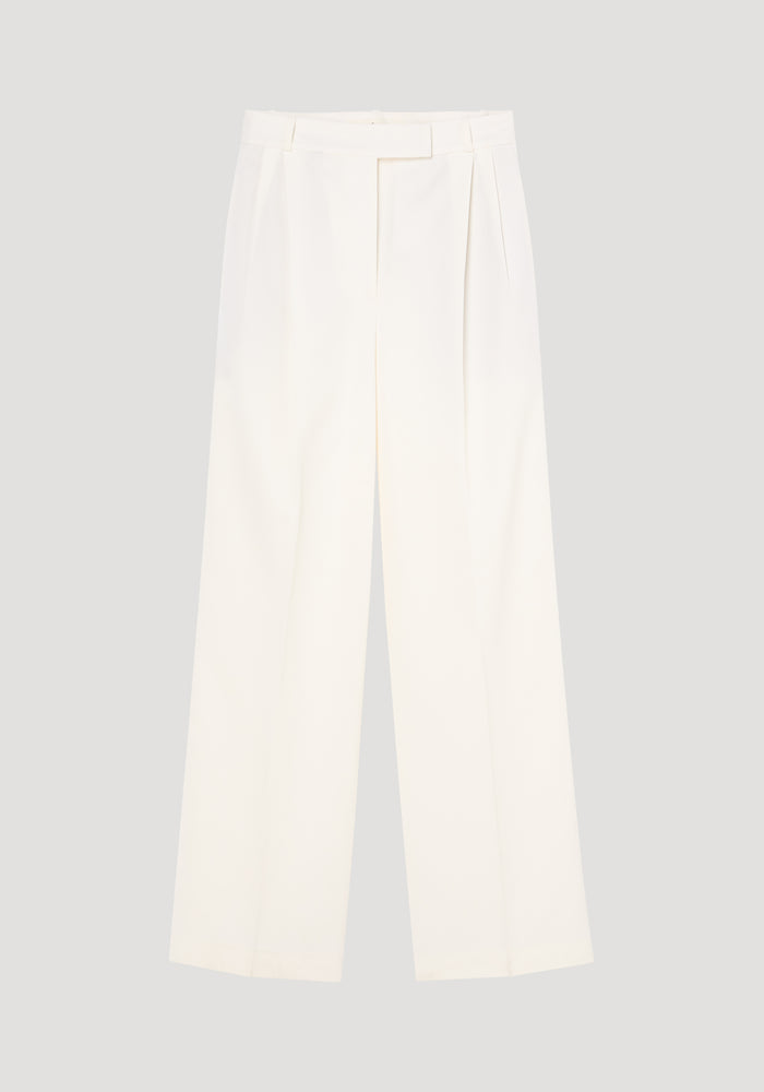 Mid-waist tailored trousers in off white with front pleats, wide leg, and belt loops, displayed on a plain background. Perfect for personal tailoring adjustments.
