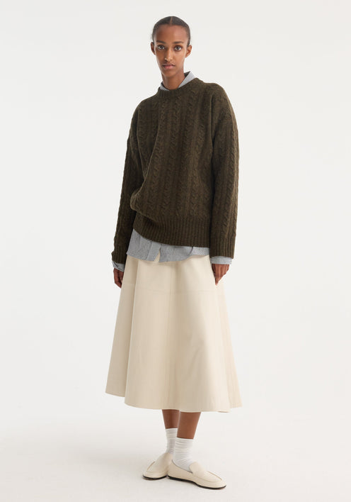 A-line leather skirt | chalk: Cream A-line midi skirt with croco embossing, soft leather, minimalist waistband, and horizontal panel seam, creating a subtly flared silhouette.