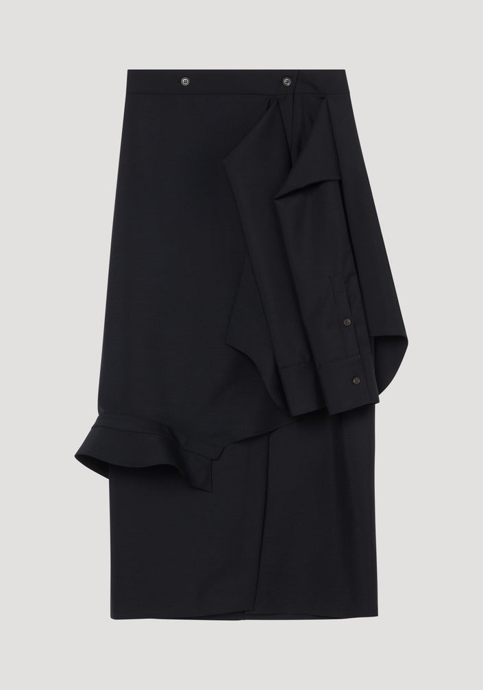 Shirt wrap skirt in black featuring an asymmetric draped overlay, buttoned waist, and deconstructed shirt-like ruffles, crafted from a soft virgin wool and mohair blend.