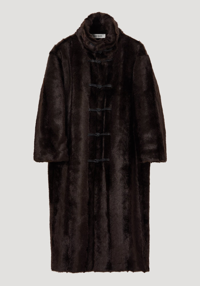 Mandarin faux fur coat in dark brown with a full-length design, stand-up collar, and five toggle-style closures, modeled in an oversized fit.