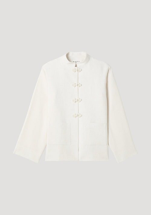 Mandarin jacket in winter white with pankou closures, square patch pockets, light silk-blend fabric, and wide sleeves; model is 179cm, wearing size EU 36.