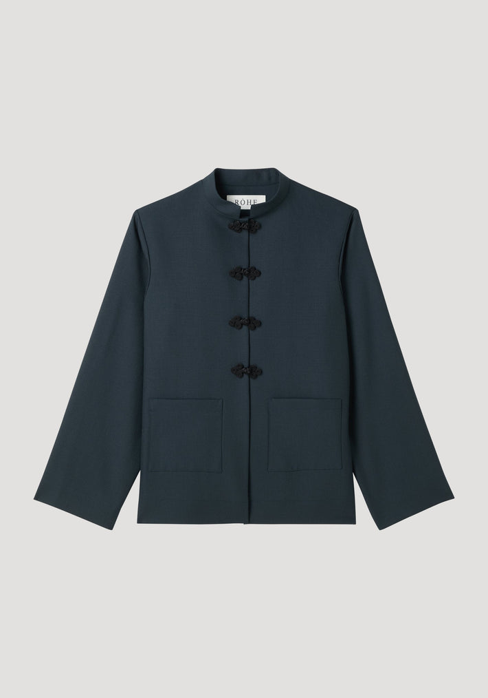 Mandarin jacket | storm: Dark-navy, hip-length with a stand-up collar, frog closures, patch pockets, and long sleeves. Made from soft, pure wool.