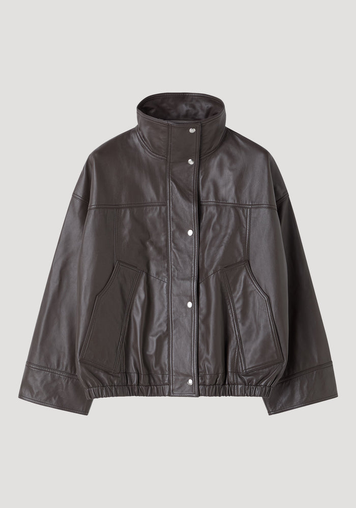 Reinvented leather jacket | earth: A minimalist bomber-style jacket with a stand-up collar, snap-button placket, oversized cut, and elasticized hem, crafted from soft leather.