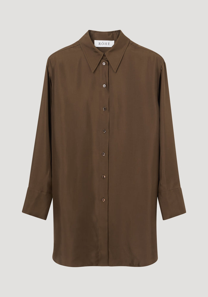 Signature elongated silk shirt | forest, featuring a rich chocolate-brown hue, oversized fit, pointed collar, button-down front, and simple cuffs. Crafted from 100% silk for elegance.