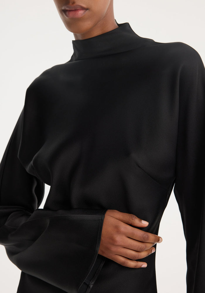 Satin waisted top | black: A sleek, long-sleeved black top with a mock neckline, featuring a smooth satin-like finish and a waisted fit.
