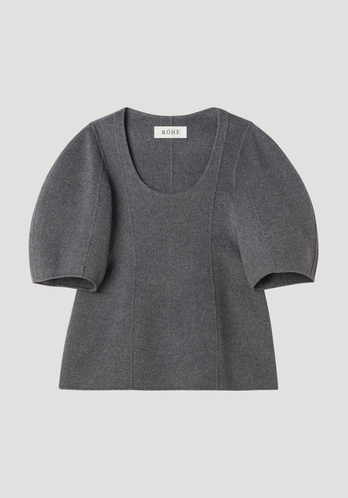 Sculptural double-faced top in mid grey melange, featuring a deep scoop neck, elbow-length balloon sleeves, and a structured peplum flare for a feminine silhouette.