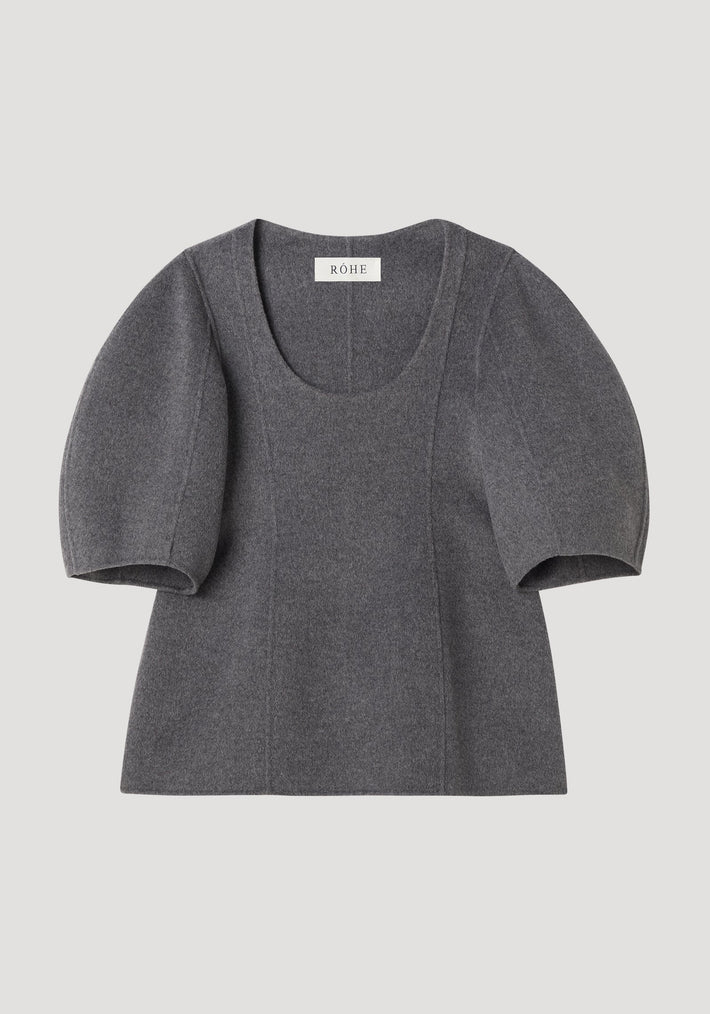 Sculptural double-faced top in mid grey melange, featuring a deep scoop neck, elbow-length balloon sleeves, and a structured peplum flare for a feminine silhouette.