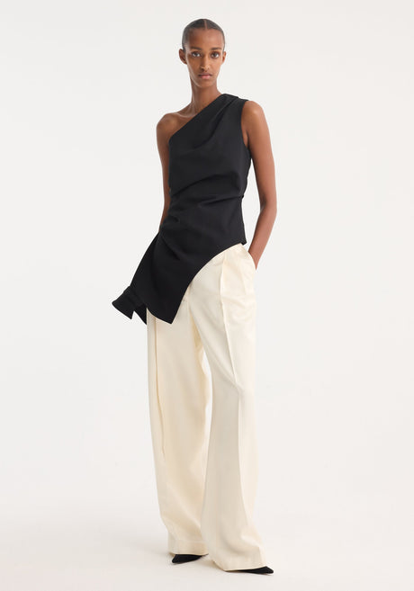 Reimagined one shoulder top | black: Black, asymmetrical top with draped detailing, fitted waist, and deconstructed upside-down collar, showcasing a unique, elegant design.