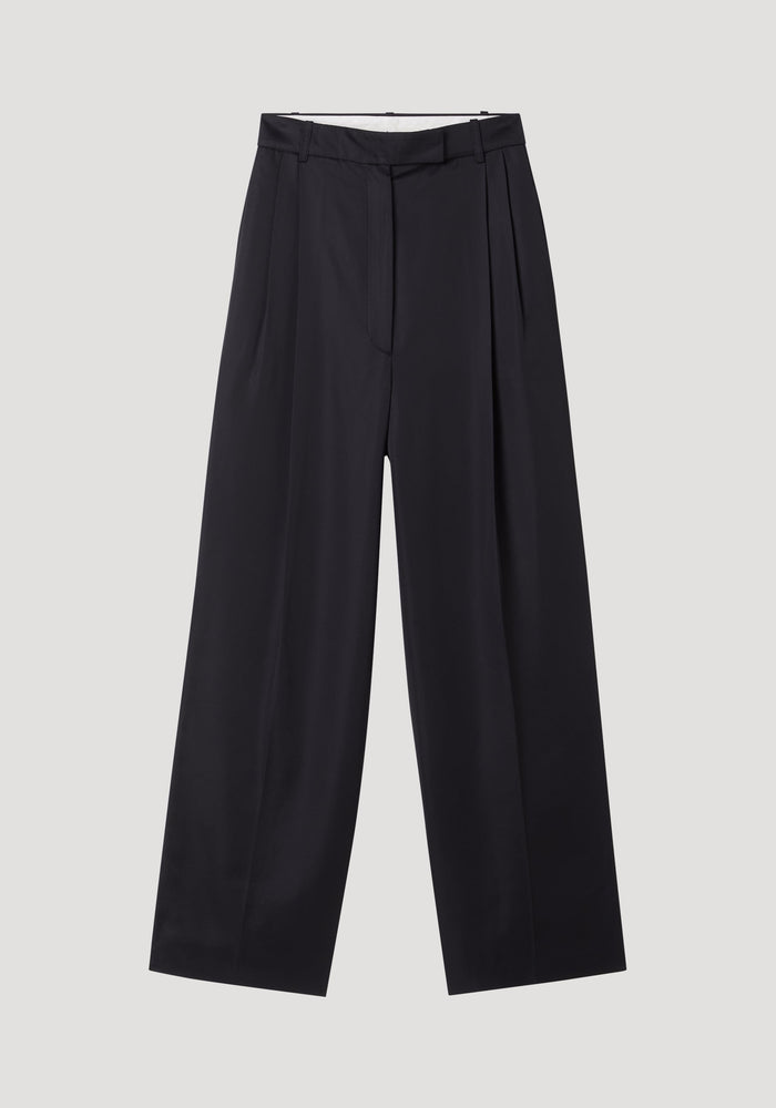 High-waist satin trousers with wide-leg design, featuring front and back pleats, tailored waistband, and welt back pockets for a polished, versatile look.