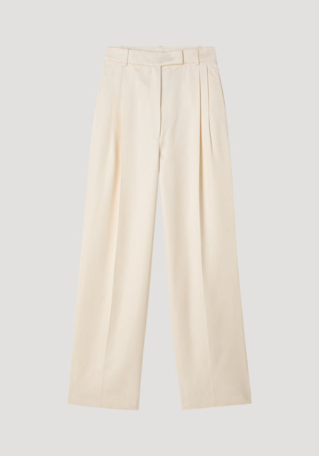 High-waist satin trousers in cream with a tailored waistband, front and back pleats, and welt pockets, laid flat on a neutral background.