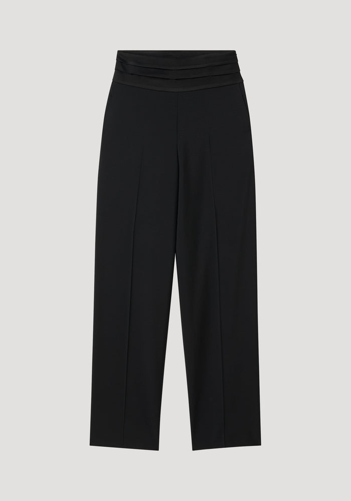 Satin cumberband trousers in black with high waist, layered waistband, and straight, wide-leg cut. Features shell-covered buttons and a concealed zip for a refined look.