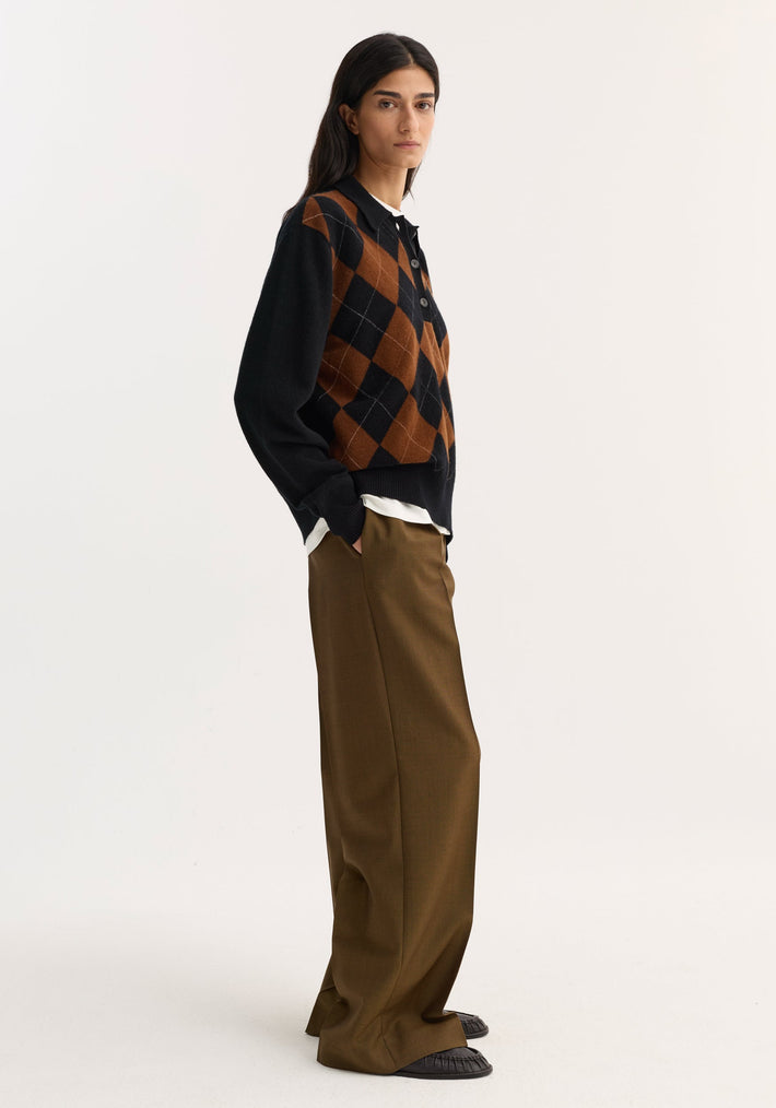 Compact knitted check polo | black rust check