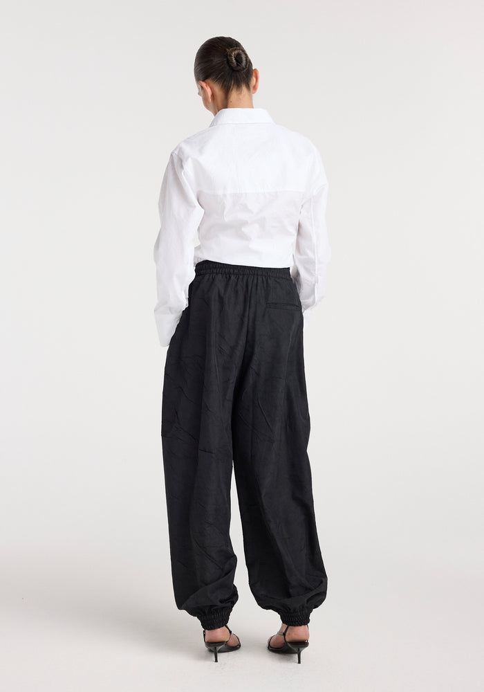 Balloon track pants | black