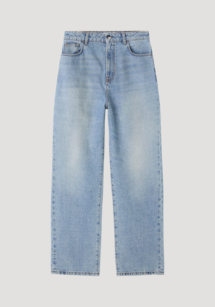 Baggy fit denim in classic blue, showcasing a low-waist, wide-leg style with five-pocket design, button-and-zip fly, and subtle faded detailing.