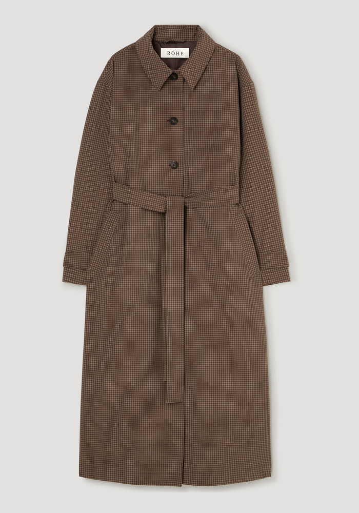 Technical check belted coat with a mini check pattern, featuring a pointed collar, side welt pockets, cuff straps, and a matching fabric belt at the waist.