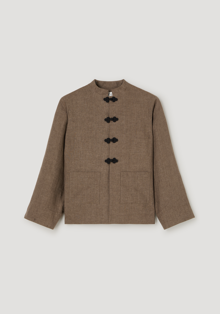 Pankou closure linen jacket in taupe-brown, featuring a boxy cut, stand-up collar, black frog closures, and patch pockets, crafted from breathable European flax linen.