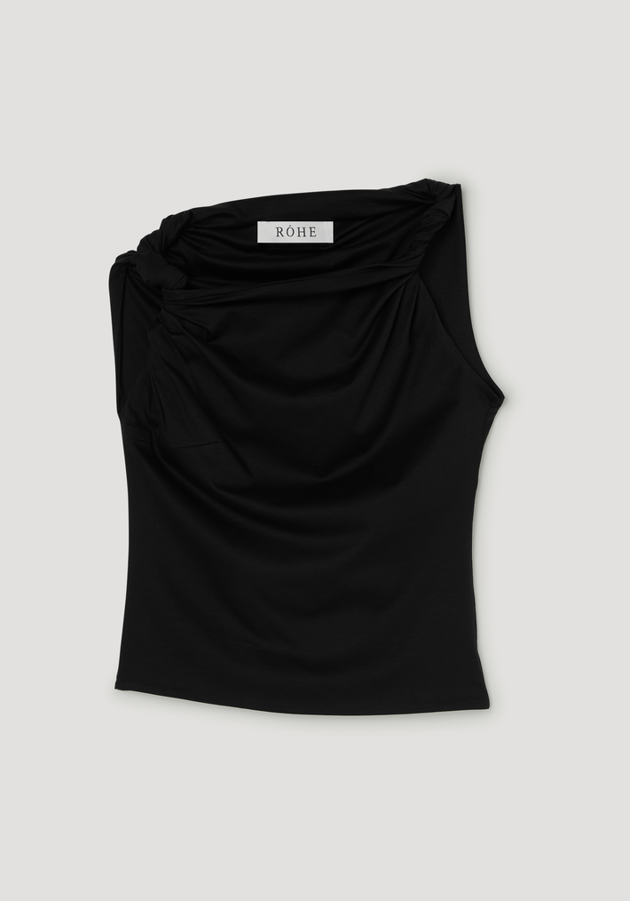 Sculptural cotton silk top | black, showcasing a draped-neck with twisted straps, soft asymmetry, and a relaxed silhouette. Features a visible RÓHE label.