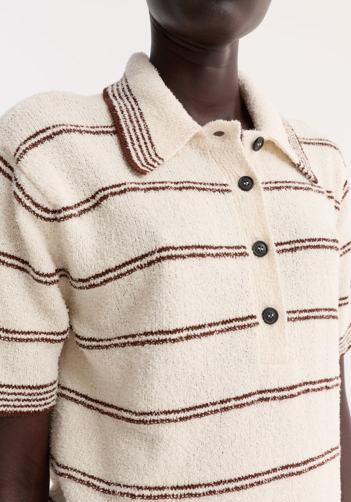 Towelling striped polo in cream/brown with a cropped fit, featuring a textured knit, short sleeves, matching collar, and a four-button placket.