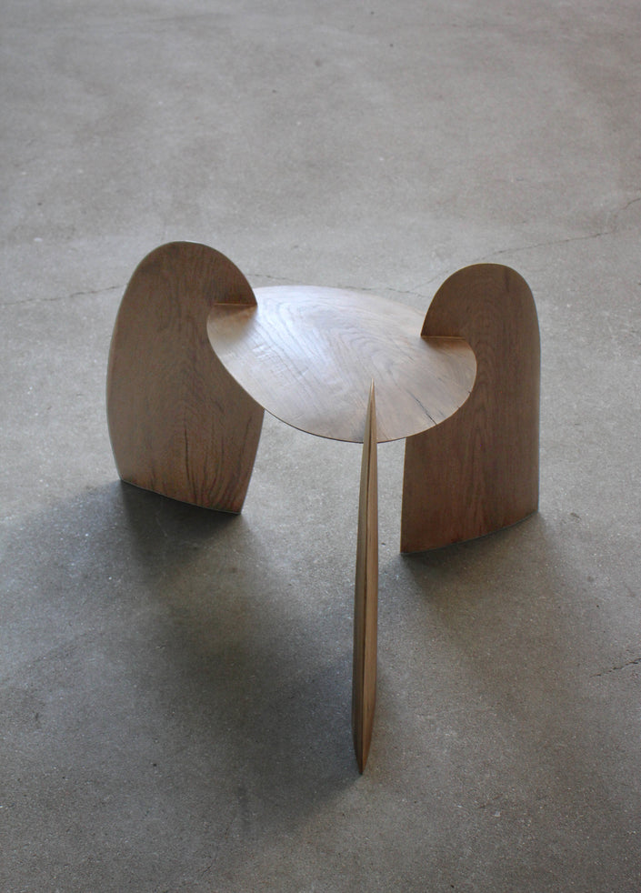 Sculpted Stool | 4673: A handcrafted, interlocking oak wood stool by Arne Kristian, featuring a dish-shaped top and biophilic design. 70cm H x 55cm W x 50cm D.