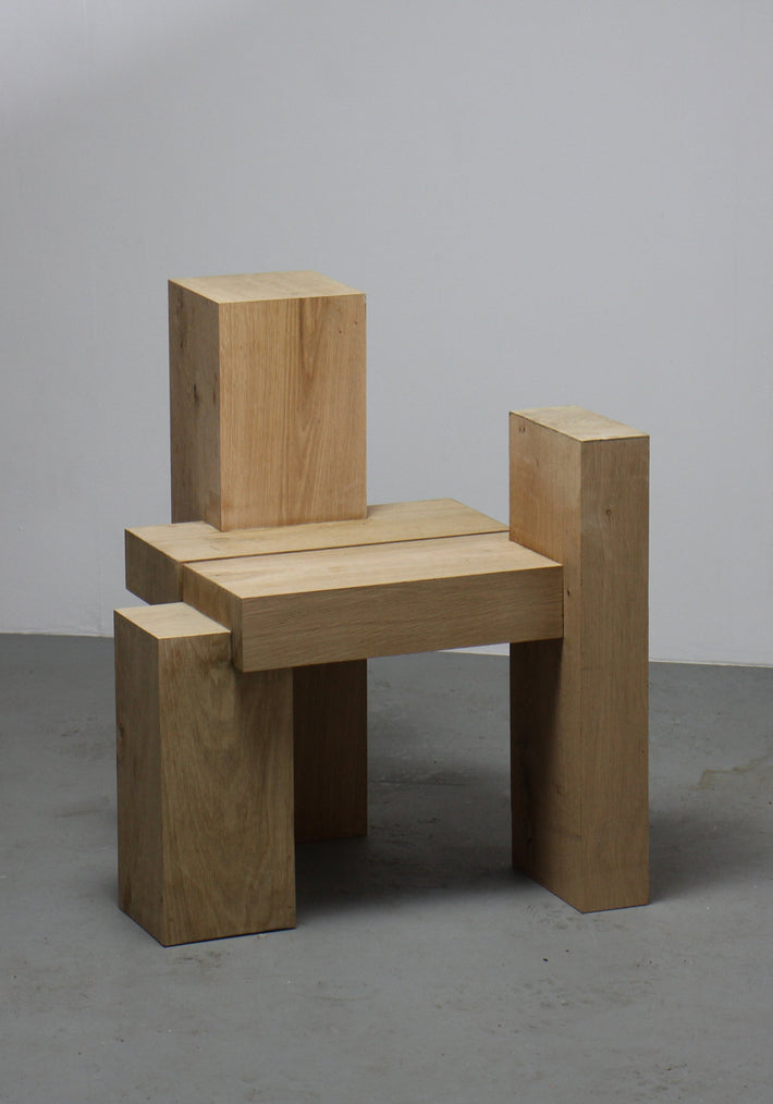 Cubistic Chair | 7365, a minimalist oak sculpture by Arne Kristian, features six beams forming a unique, abstract chair-like design, showcasing cubistic art in furniture.