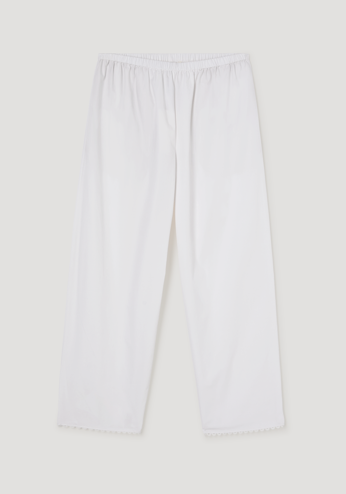 Embroidered poplin trousers in optic white feature a wide-leg silhouette, elastic waistband, ankle length, and side pockets, made from 100% cotton.