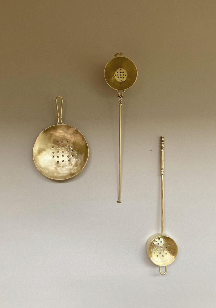 Tea Strainer set with perforated bowls and handles, handcrafted by Misae Nikkei in Kyoto, inspired by daily rituals, ideal for draining or infusing.