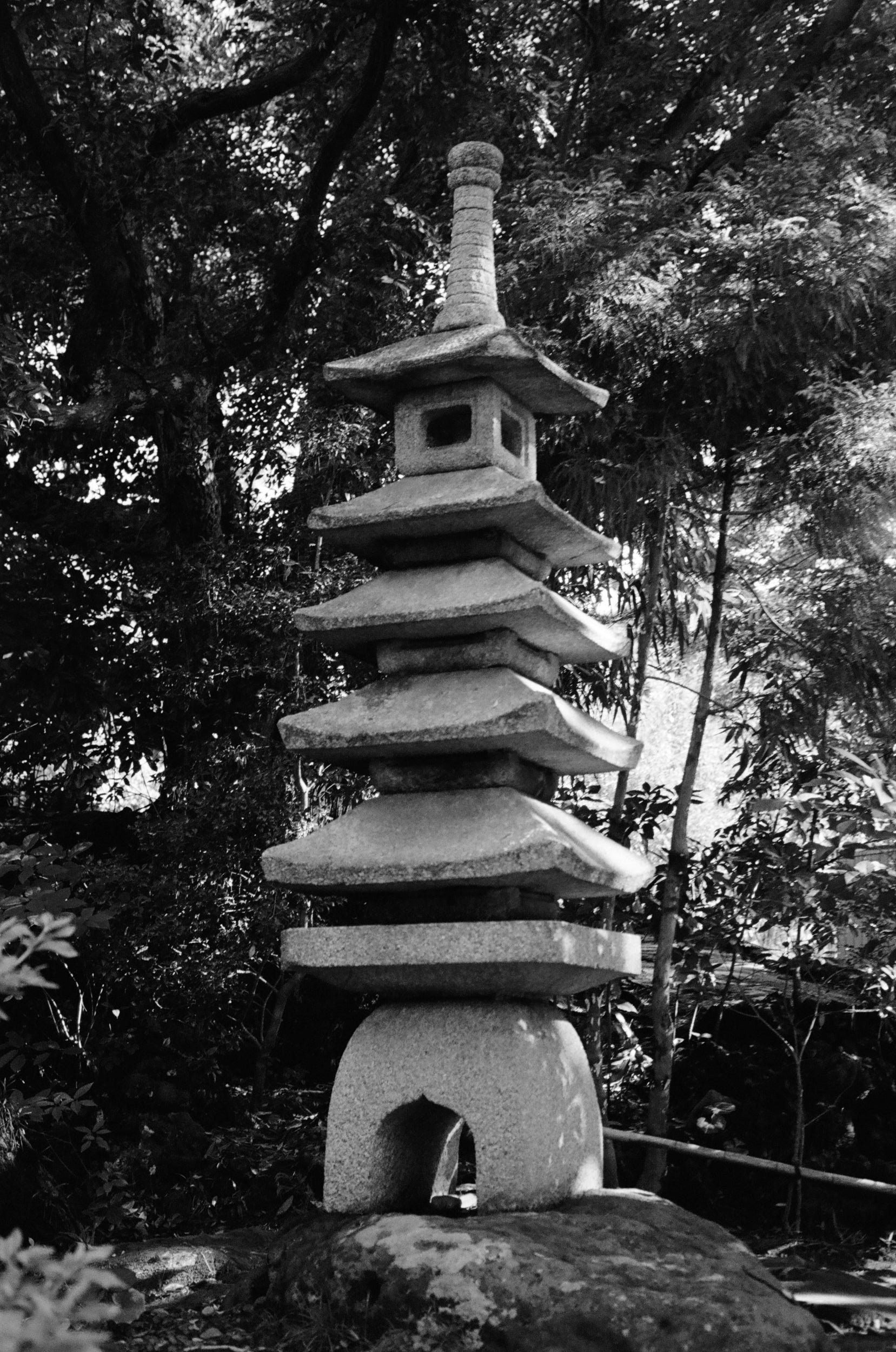 Sculpture in Japanese garden made of stacked stones. 