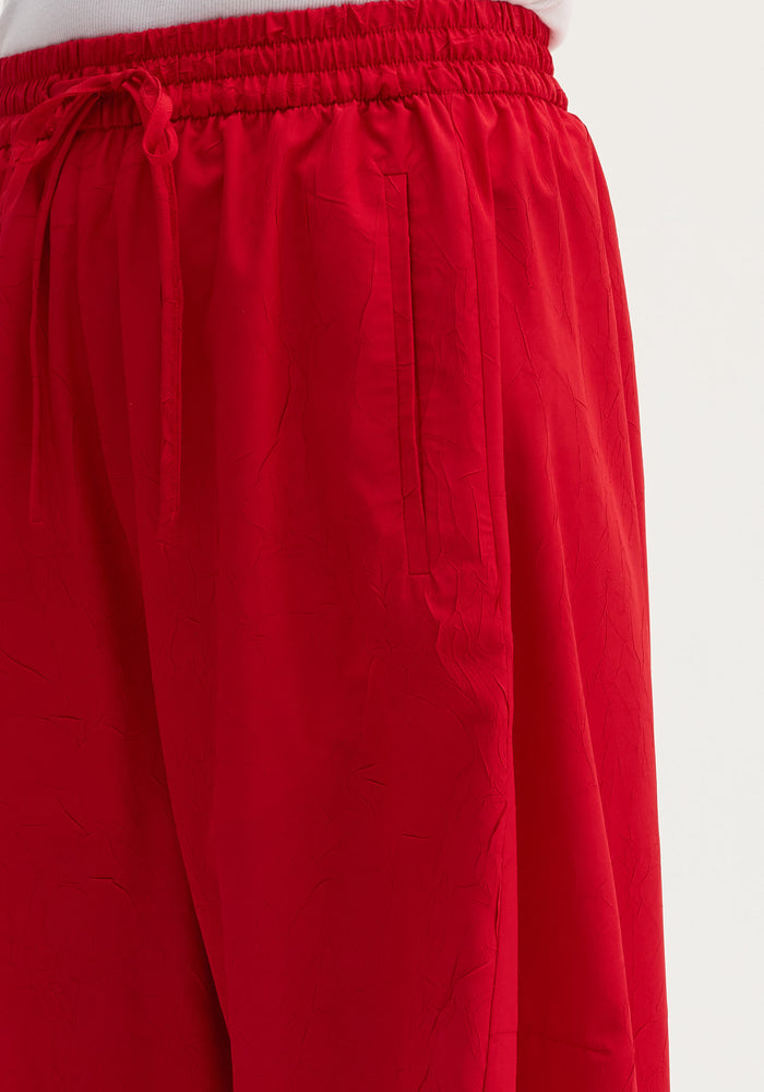Balloon track pants | red