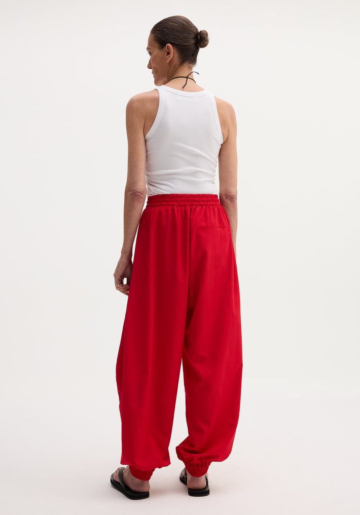 Balloon track pants | red
