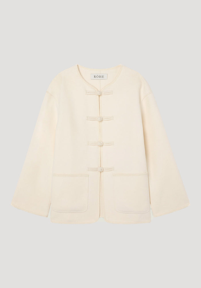 Mandarin double-faced wool jacket | off white with a round neckline, frog-style button closures, embroidered edges, and patch pockets; straight and relaxed fit.