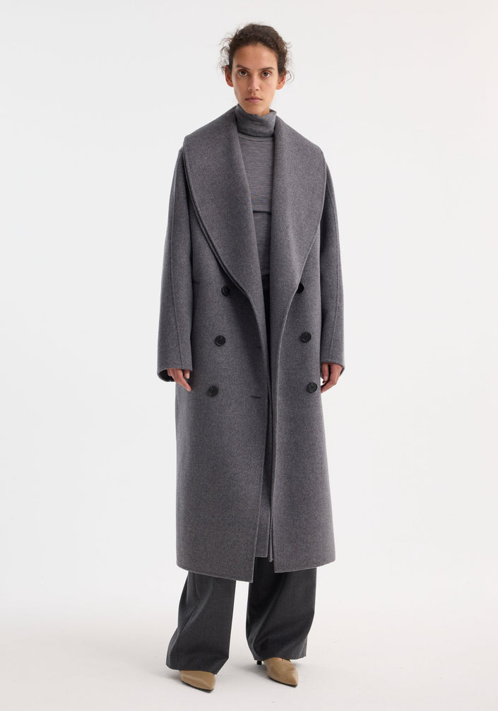 Signature double-faced scarf coat in mid grey melange, featuring a double-layered scarf collar, double-breasted design, and wide-leg trousers for a minimalist, sophisticated look.