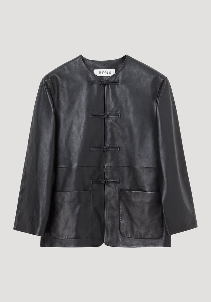 Mandarin leather jacket | black features a collarless design with pankou closures, long sleeves, and two hip patch pockets, crafted from 100% sheep leather.