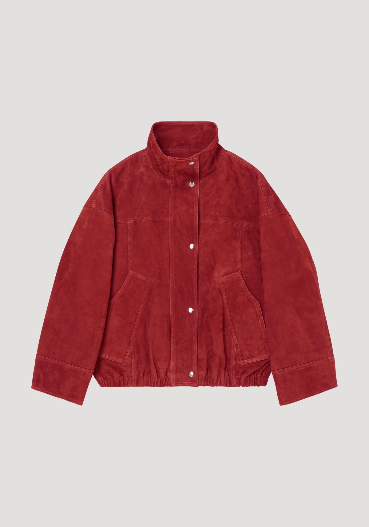 Reinvented suede jacket | red front view showing a red suede jacket with stand collar button closure long sleeves welt pockets and elastic hem
