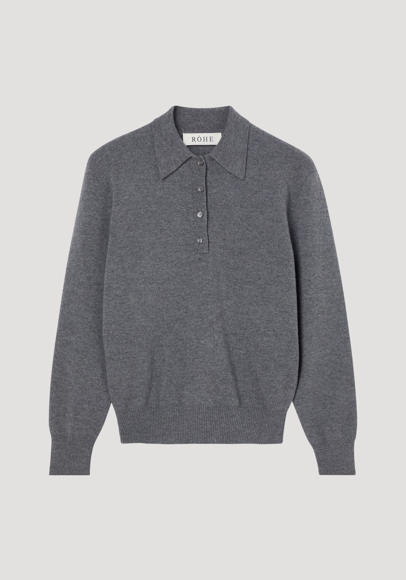 Compact knitted polo in mid grey melange, featuring a long-sleeve design, pointed collar, four-button placket, and ribbed cuffs, crafted from Italian wool-cashmere blend.