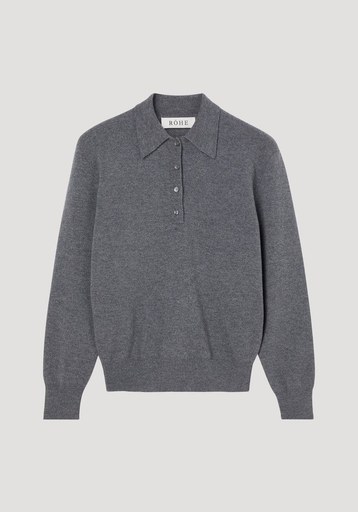 Compact knitted polo in mid grey melange, featuring a long-sleeve design, pointed collar, four-button placket, and ribbed cuffs, crafted from Italian wool-cashmere blend.