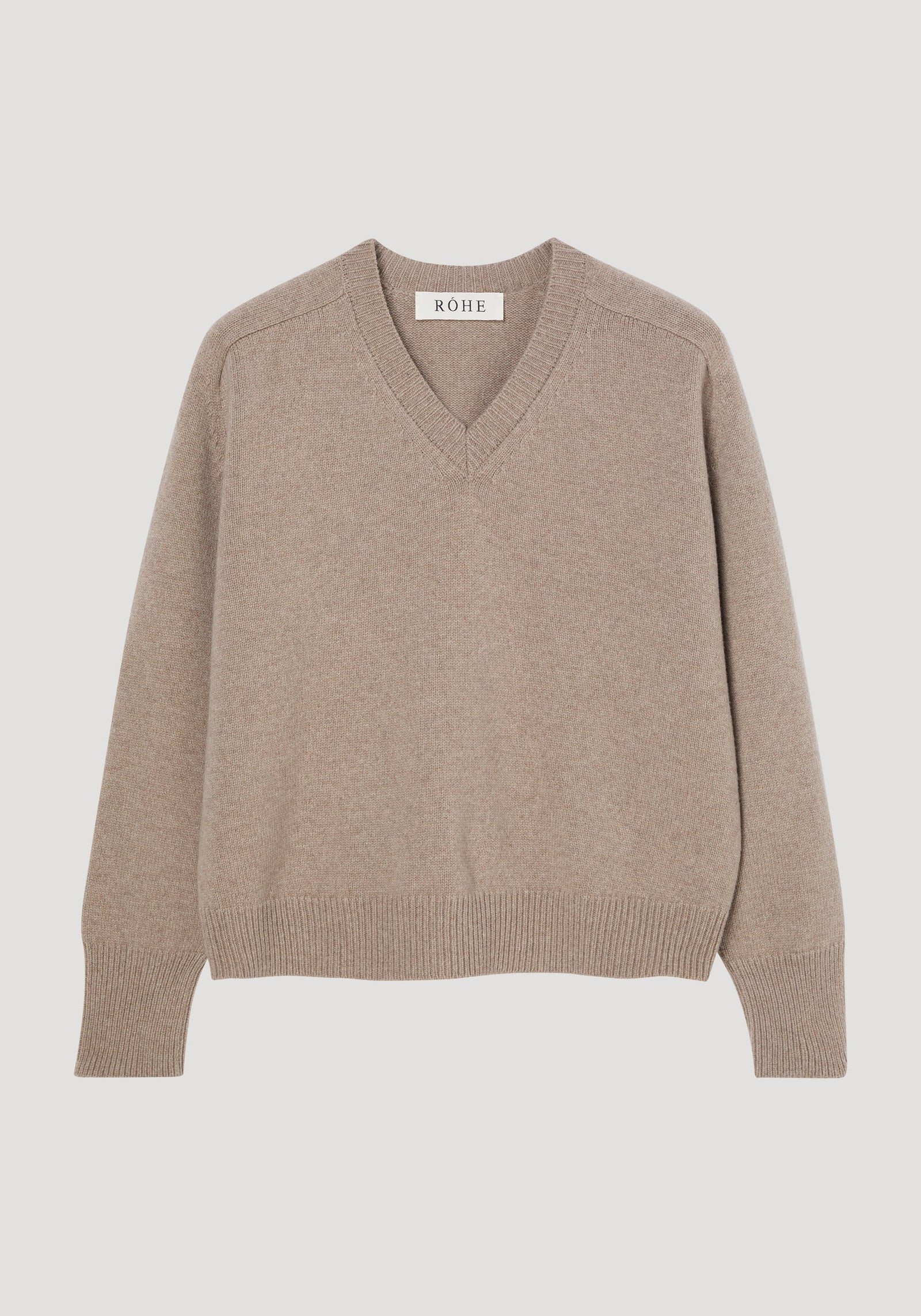 Sleeve wrap jumper in taupe melange, showing V-neck, ribbed cuffs and hem, relaxed fit. Crafted from a cashmere-wool blend, features twistable sleeves for versatile styling.