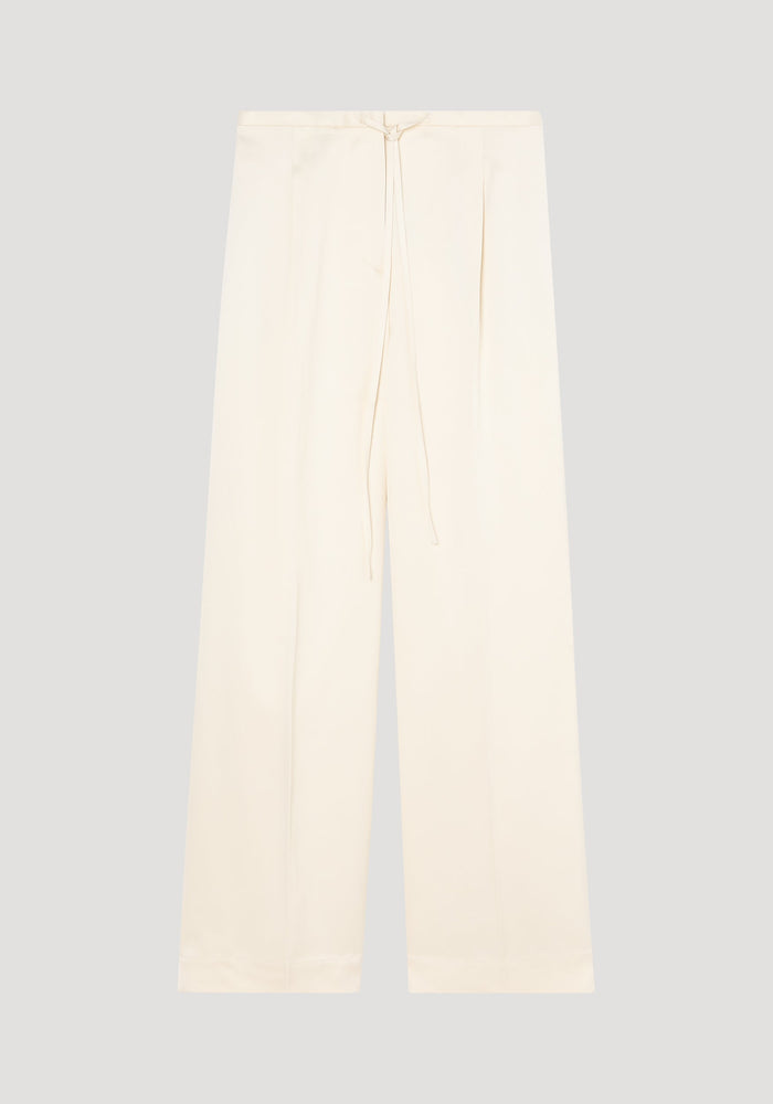 Relaxed drawstring satin trousers in cream, featuring a wide-leg design, high waist with a front tie, subtle pleats, and back welt pockets.