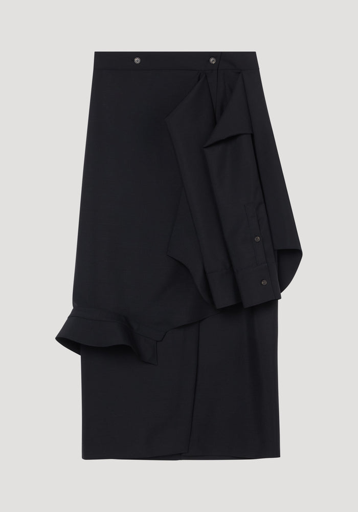 Shirt wrap skirt in black featuring an asymmetric draped overlay, buttoned waist, and deconstructed shirt-like ruffles, crafted from a soft virgin wool and mohair blend.