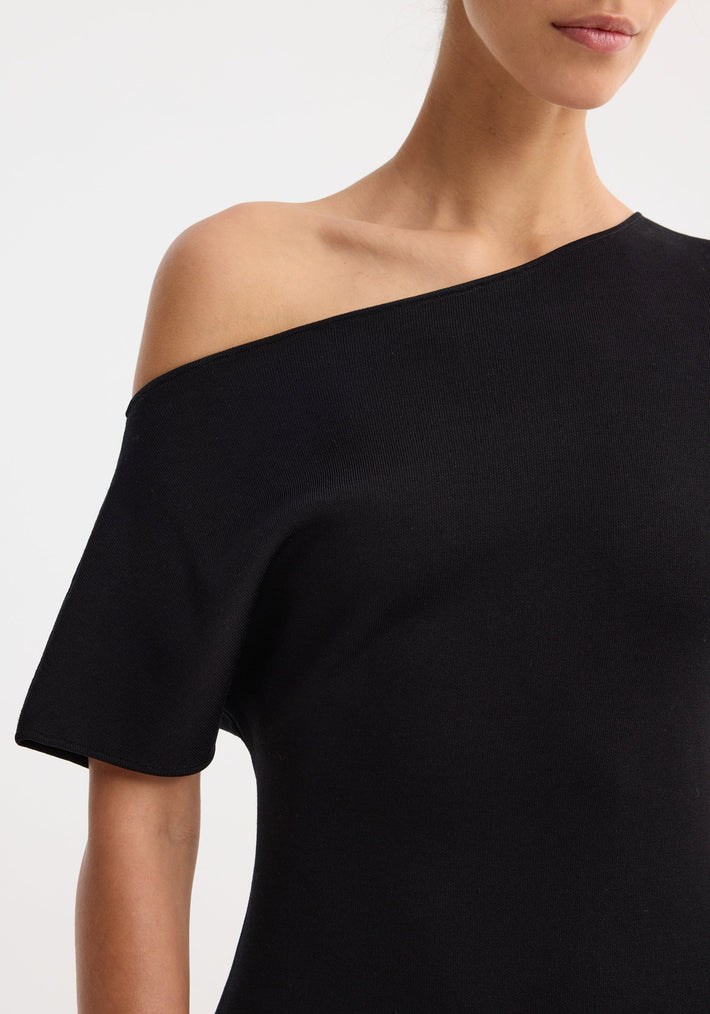 Asymmetrical knitted dress | black showcasing quiet confidence through intentional tailoring, elevated minimalism, and sculptural craftsmanship in its timeless design; an investment piece crafted from high-end Italian fabrics.