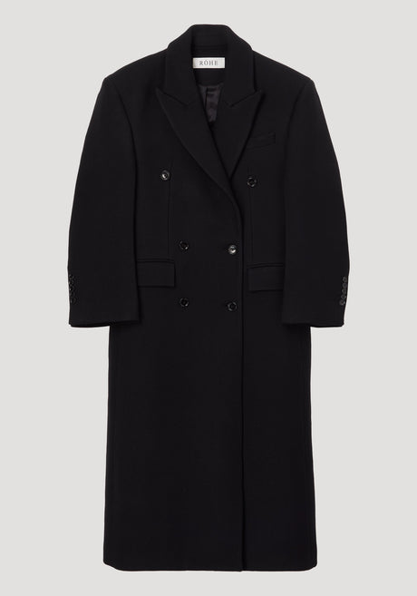 Hourglass wool coat | black, featuring a long, double-breasted design with six buttons, structured shoulders, and a feminine waist. Made from 100% virgin wool.