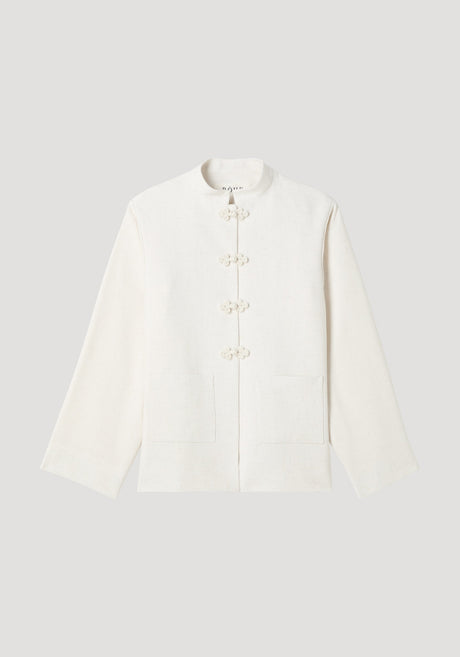 Mandarin jacket in winter white with pankou closures, square patch pockets, light silk-blend fabric, and wide sleeves; model is 179cm, wearing size EU 36.