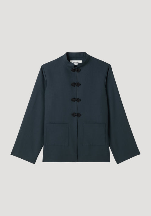 Mandarin jacket | storm: Dark-navy, hip-length with a stand-up collar, frog closures, patch pockets, and long sleeves. Made from soft, pure wool.