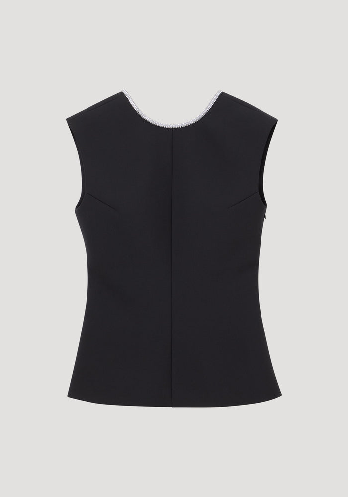 Open back appliqué top in black with a scooped neckline, rhinestone trim, seam-shaped darts, and crystal appliqué along the open back, laid flat.