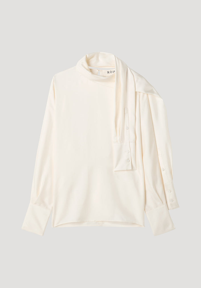 Foulard silk top | cream: Off-white blouse with draped scarf-like neck, button-cuff sleeves, and fluid silhouette. Made from pure silk, featuring RÓH label.