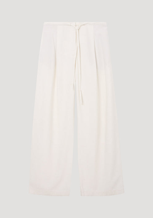 Relaxed drawstring trousers in winter white, featuring a wide-leg silhouette, lightweight silk-blend fabric, drawstring waistband, and subtle pleating for effortless movement.
