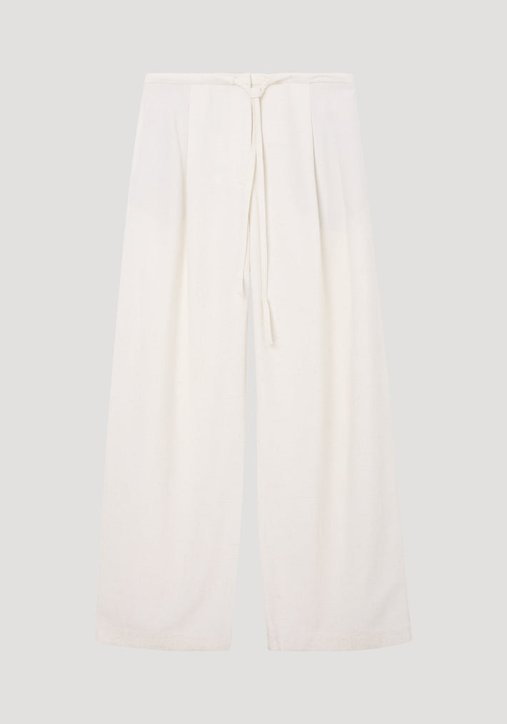 Relaxed drawstring trousers in winter white, featuring a wide-leg silhouette, lightweight silk-blend fabric, drawstring waistband, and subtle pleating for effortless movement.